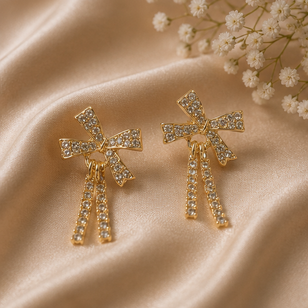 Glistening Crystal Pave Bow Dangle Earrings | MPS & Co.