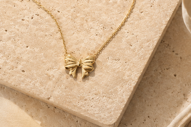 Chic Sculpted Ribbon Bow Pendant | MPS & Co.